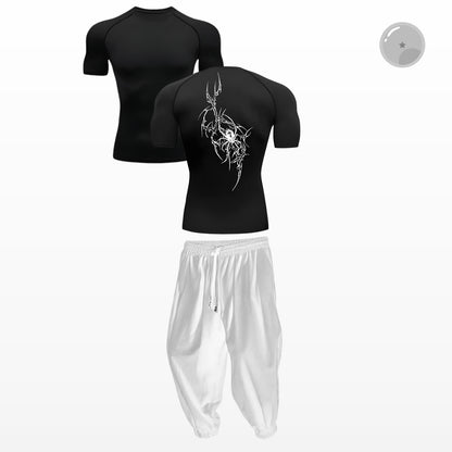 Black athletic shirt with white design on the back and white pants on a white background
